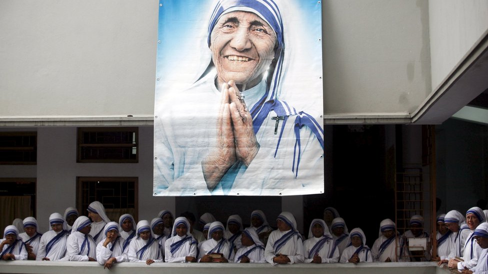 Catholic nuns from the order of the Missionaries of Charity gather under a picture of Mother Teresa during the tenth anniversary of her death in Kolkata, India, (2007 file pic) Catholic nuns from the order of the Missionaries of Charity gather under a picture of Mother Teresa during the tenth anniversary of her death in Kolkata, India, (2007 file pic)