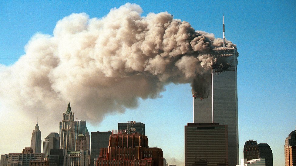 Smoke pours from the World Trade Center in New York after it was hit by two hijacked passenger planes on 11 September, 2001.