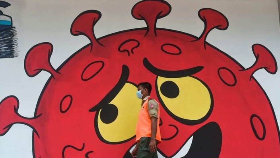 করোনাভাইরাস নিয়ে দেয়ালচিত্র।