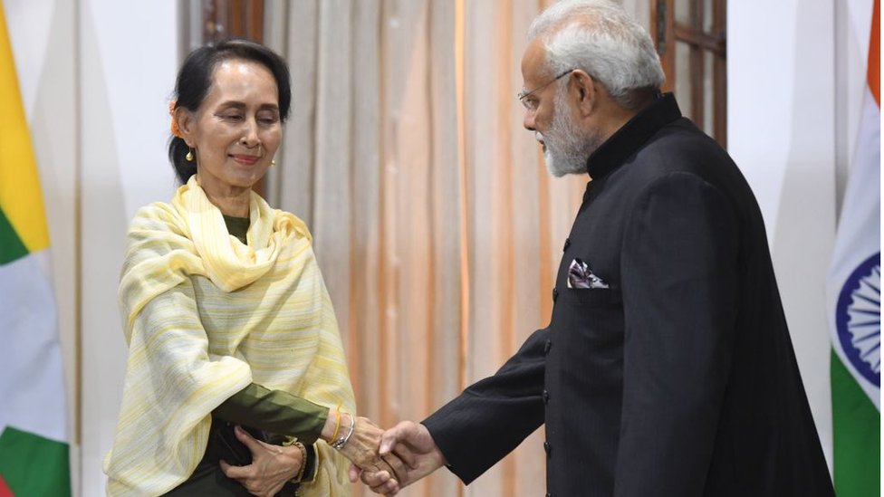 অং সান সু চি ও নরেন্দ্র মোদী।